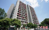 成都一栋30层高居民楼被三角梅扮靓